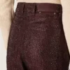 Women's jeans in burgundy denim with gradient crystals