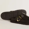 Women's Lucy Sabot in glossy black leather with gold metal buckle