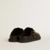 Women's Lucy Sabot in glossy black leather with gold metal buckle