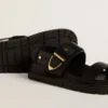 Women's Lucy sandal in glossy black leather with gold metal buckle