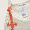 Women's macramé bag in butter-colored cotton with a leather lobster charm