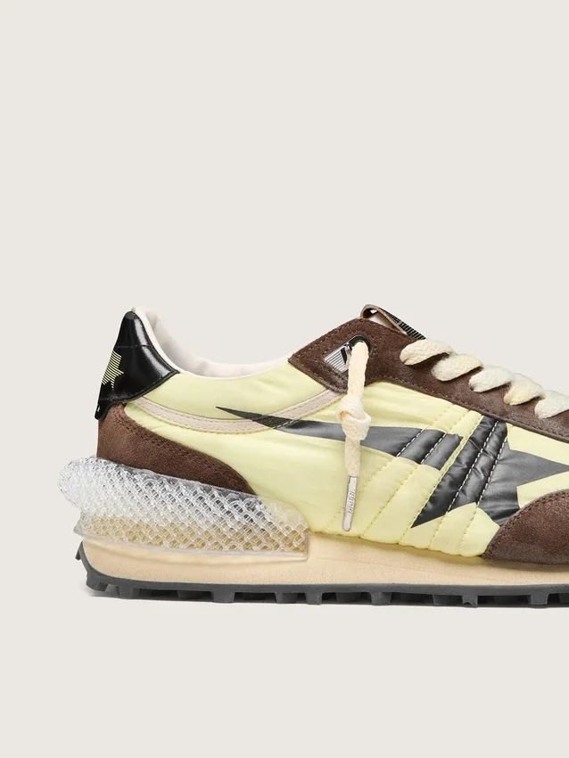 Women’s Marathon in lime-green nylon with black star and brown suede inserts