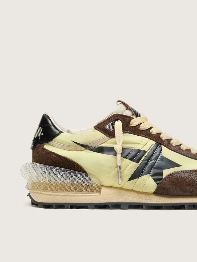 Women’s Marathon in lime-green nylon with black star and brown suede inserts