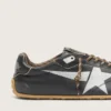 Men's Marathon Speed with black leather upper and silver star