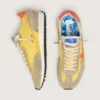 Women’s Marathon with yellow nylon upper and orange star