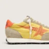 Women’s Marathon with yellow nylon upper and orange star