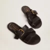 Women's Margaret flat sandals in black resin-coated leather