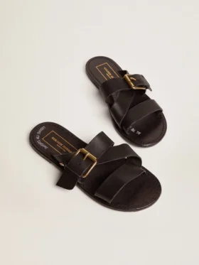 Women’s Margaret flat sandals in black resin-coated leather