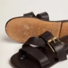 Women's Margaret flat sandals in black resin-coated leather