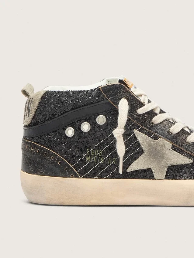 Women’s Mid Star in black glitter with dove-gray suede star and heel tab