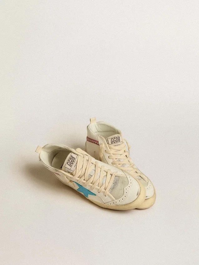 Women's Mid Star in leather with light blue star and fuchsia suede flash with platinum studs