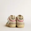 Women's Mid Star in leather with light blue star and fuchsia suede flash with platinum studs