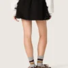 Women’s miniskirt in black cotton twill with floral sequin embroidery