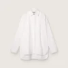 Women's oversized shirt in white cotton with pleated detail and jewel buttons