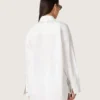 Women's oversized shirt in white cotton with pleated detail and jewel buttons
