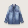 Women's oversized shirt with a lived-in denim effect