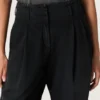Women's pants in black cotton denim with a lived-in treatment