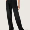 Women's pants in black cotton denim with a lived-in treatment