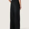 Women's pants in black cotton denim with a lived-in treatment