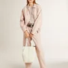Women's pink dyed denim bomber jacket
