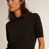 Women’s polo shirt in black merino wool
