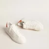 Women’s Purestar with white leather star and orange heel tab