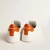 Women’s Purestar with white leather star and orange heel tab