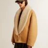Women's sheepskin jacket with a wide shearling shawl collar