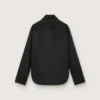 Women's shirt in black wool twill with floral embroidery in glass beads