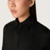 Women's shirt in black wool twill with floral embroidery in glass beads
