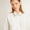 Women's shirt with a vertical striped pattern and crystal embroidery
