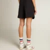 Women's shorts in black wool gabardine with waist belt