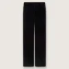 Women's slim-fit flared pants in black cotton velvet