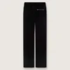 Women's slim-fit flared pants in black cotton velvet