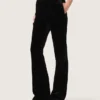Women's slim-fit flared pants in black cotton velvet