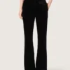 Women's slim-fit flared pants in black cotton velvet