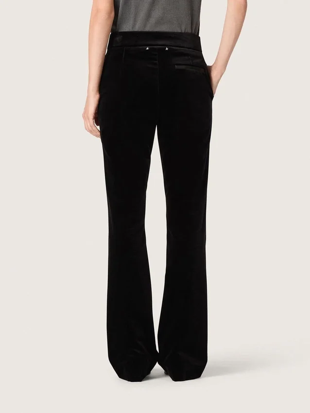 Women's slim-fit flared pants in black cotton velvet