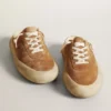 Women's Space-Star Sabot in tobacco-colored suede with perforated star