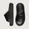 Women's Space-Star slip-ons in black leather