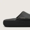 Women's Space-Star slip-ons in black leather
