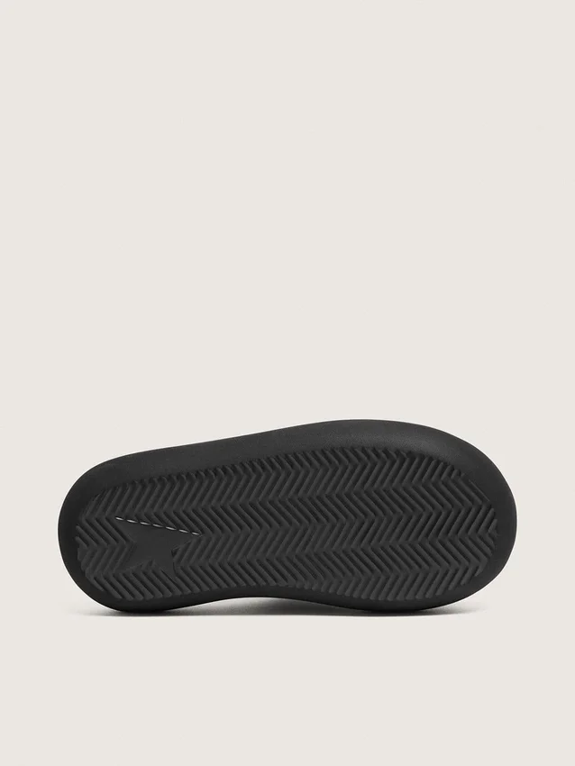 Women's Space-Star slip-ons in black leather