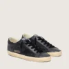 Women's Super-Star in black glitter with black suede star and leather inserts