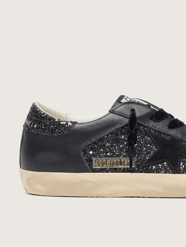 Women's Super-Star in black glitter with black suede star and leather inserts