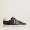 Women’s Super-Star in black nappa leather with zebra-print pony skin star and beige leather heel tab