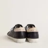 Women’s Super-Star in black nappa leather with zebra-print pony skin star and beige leather heel tab