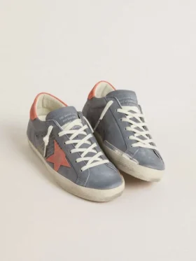 Women’s Super Star in blue nubuck with pink suede star and heel tab