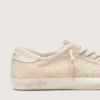 Men’s Super-Star in cream suede with perforated star and bead insert