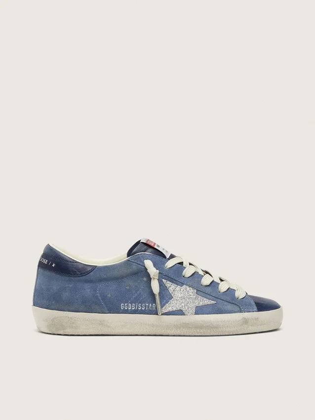 Women’s Super-Star in denim-blue suede with silver glitter star