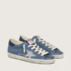 Women’s Super-Star in denim-blue suede with silver glitter star