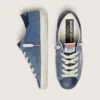Women’s Super-Star in denim-blue suede with silver glitter star
